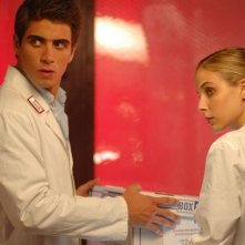 Maria P. Petruolo e Marco Rossetti in una foto di scena di R.I.S. Roma