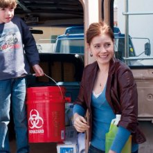 Jason Spevack e Amy Adams in una scena del film Sunshine Cleaning