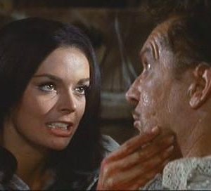 Vincent Price e Barbara Steele in una scena del film Il pozzo e il pendolo