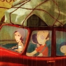 Il piccolo protagonista Nat insieme ai genitori Julie e Denis nel film Nat e il segreto di Eleonora (Eleanor's Secret)