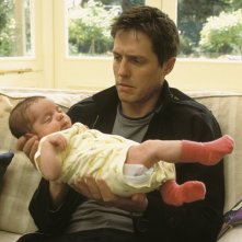 Hugh Grant (Will) in una scena di About a Boy