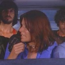 Maurice Poli in auto con Lea Lander, Riccardo Cucciolla, George Eastman e Don Backy in Semaforo Rosso