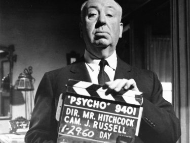 Wallpaper del film Psycho con Hitchcock sul set