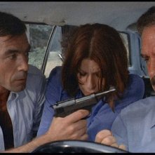 Maurice Poli con Lea Lander e Riccardo Cucciola in una scena di Semaforo rosso (Cani arrabbiati) di M. Bava