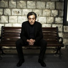 Il regista Elia Suleiman nel suo film autobiografico The Time That Remains