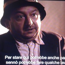 Orfeo Orlando in una scena de L'uomo che verrà film vincitore del David di Donatello 2010