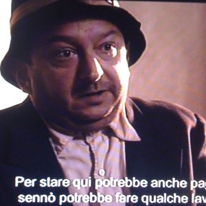 Orfeo Orlando in una scena de L'uomo che verrà film vincitore del David di Donatello 2010