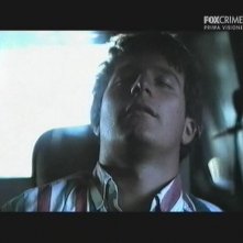 Giacomo Carolei in una scena della miniserie Il mostro di Firenze