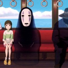 Chihiro e il misterioso Senza Volto  in una scena de La città incantata - Spirited Away