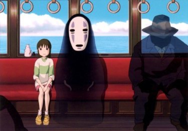 Chihiro e il misterioso Senza Volto  in una scena de La città incantata - Spirited Away