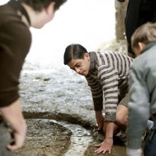 Brian Fenzi interpreta Lino da piccolo nel film Una sconfinata giovinezza