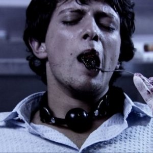 Marco Martini in una scena dell'horror IN THE MARKET