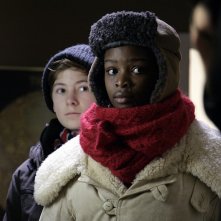 Due piccoli personaggi del film Tornando a casa per Natale