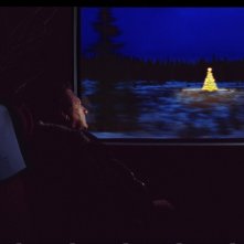 Reidar Sørensen addormentato nel film Tornando a casa per Natale