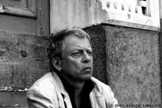 Un primo piano di Paolo Rossi nel film RCL - Ridotte Capacità Lavorative di M. Carboni