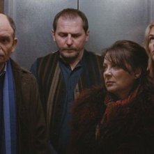 Jean-Pierre Darroussin e Josiane Balasko in una scena della commedia Holiday