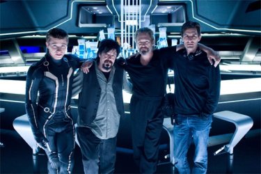 Il regista Joseph Kosinski sul set di Tron Legacy tra Sam Flynn e Jeff Bridges