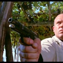 Gastone Moschin in una scena del film Milano calibro 9