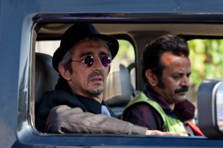 Sergio Rubini in una scena del film Qualunquemente