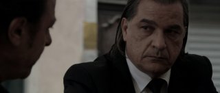 Gérard Meylan in una scena del film Le Thanato