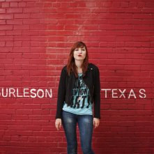 Wallpaper: un'immagine di Liz Lee tra la scritta Burleson Texas