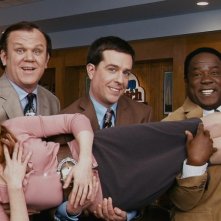 John C. Reilly, Ed Helms e Isiah Whitlock Jr. con Anne Heche nel film Cedar Rapids