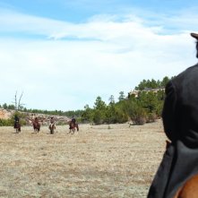 Jeff Bridges in una surreale immagine del western coeniano True Grit
