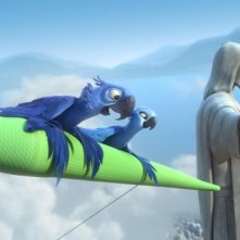 Due protagonisti di Rio in 3D sfiorano in volo il Cristo Redentor di Rio de Janeiro