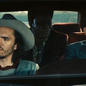 Una scena della commedia on the road Robert Mitchum est mort con Olivier Gourmet