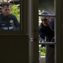 George Eads e Laurence Fishburne in una scena dell'episodio Hitting for the Cycle di CSI: Scena del crimine