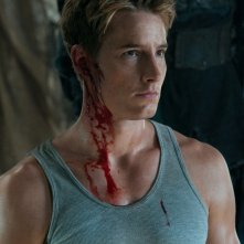 Un ferito Oliver (Justin Hartley) in un momento dell'episodio Dominion di Smallville