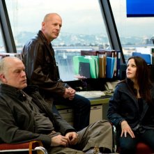 John Malkovich con Bruce Willis e Mary-Louise Parker in una scena del film Red