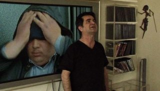 Una immagine di Jafar Panahi nella pellicola In Film Nist