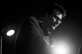 Il regista Michel Hazanavicius sul set del suo film The Artist