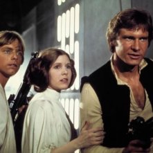 Carrie Fisher, Mark Hamill e Harrison Ford in una scena di Guerre Stellari