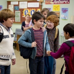 Zachary Gordon (al centro) nel film Diario di una schiappa 2