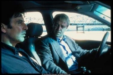 Al Pacino e Russell Crowe em cena do filme Insider de Michael Mann