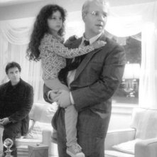 Al Pacino, Hallie Kate Eisenberg e Russell Crowe nel film Insider - Dietro la verità di Michael Mann