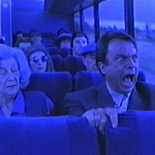 Sam Neill nel film Il seme della follia (1995)