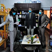 Contagion: Marion Cotillard e Chin Han e Sun Feng nel film