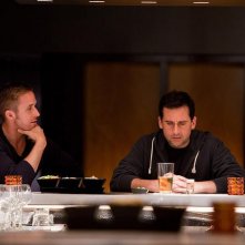 Steve Carell accanto a Ryan Gosling in una scena di Crazy, Stupid Love