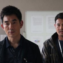 A sinistra, Richie Ren nel film Life Without Principle