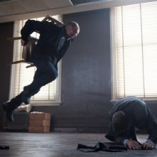 Jason Statham in una sequenza di Killer Elite con David Whiteley