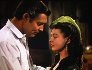 Clark Gable e Vivien Leigh in una scena di Via col vento