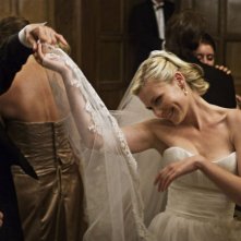 Kirsten Dunst e John Hurt in una scena di ballo in Melancholia