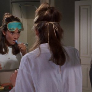 Colazione da Tiffany: Audrey Hepburn in una scena del film insieme a George Peppard