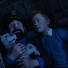 Tintin, capitan Haddock e Snowy in una scena di Le Avventure di Tintin: il segreto dell'unicorno