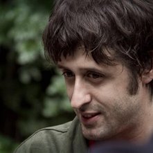 Un bel primo piano di Francesco Brandi protagonista del film Missione di pace