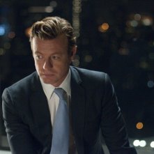 Margin Call: Simon Baker in una scena del film