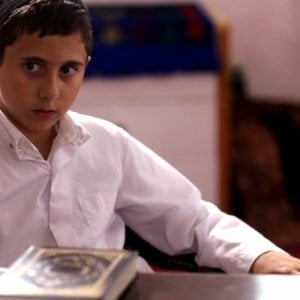 David, il piccolo Muatasem Mishal in una scena del film